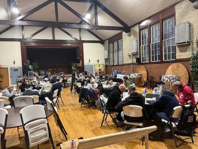 Friends sharing a meal at Dinner Church
